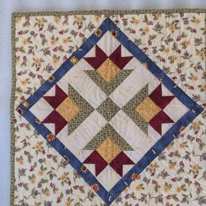 Handmade quilt square measures 19 1/2 " x19 1/2"